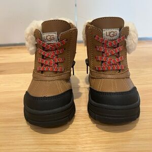 UGG Kids Tan and Black Boots with Red Laces